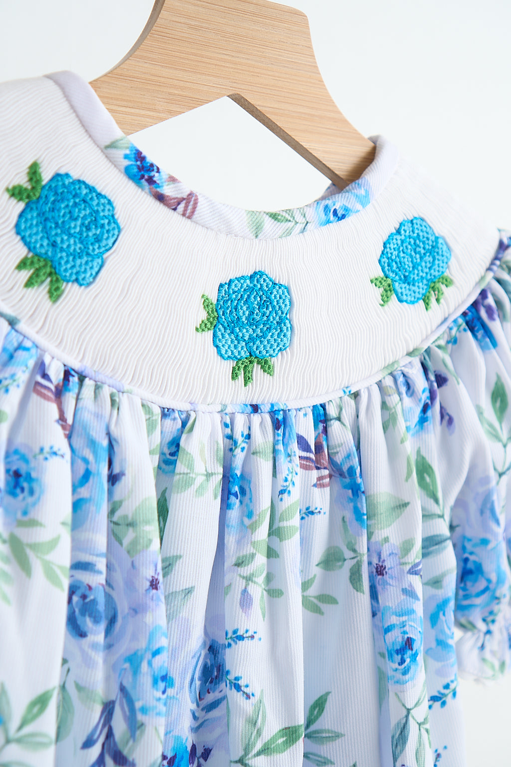 Blue rose hand smocked print girl romper - Giggles with Grace