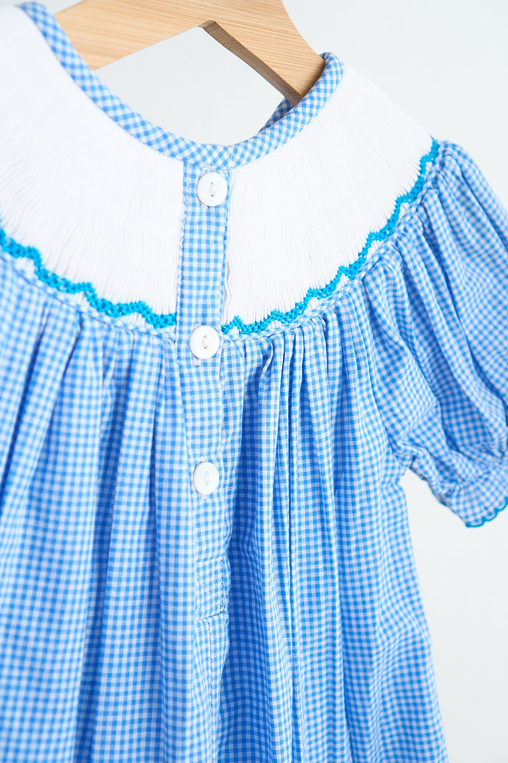 Blue snow princess hand smocked gingham girl romper - Giggles with Grace