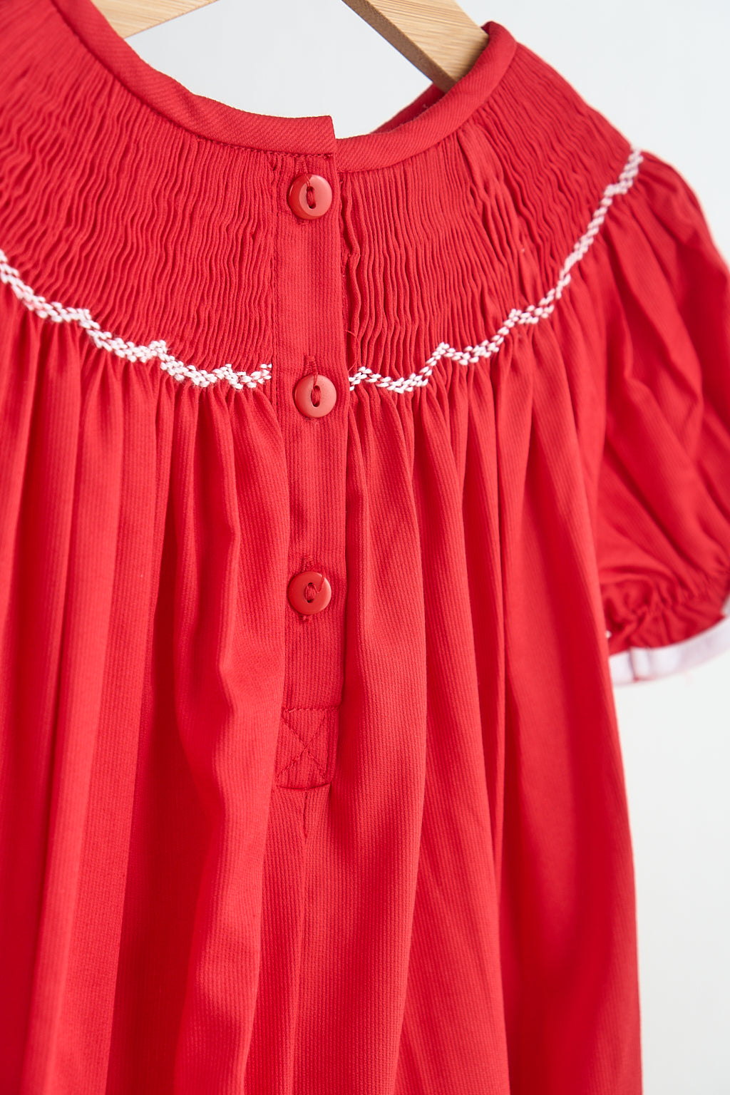 Red candy hand smocked girl romper - Giggles with Grace